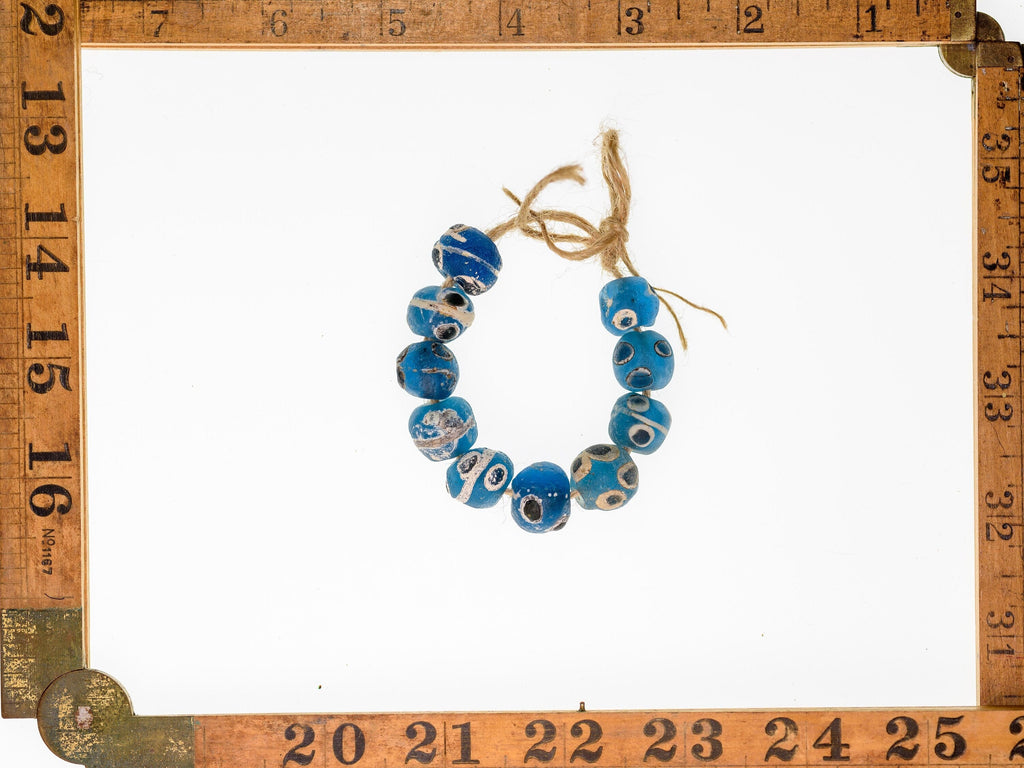 A short strand of 10 Large Ancient Islamic Period Blue Evil Eye Beads 0008