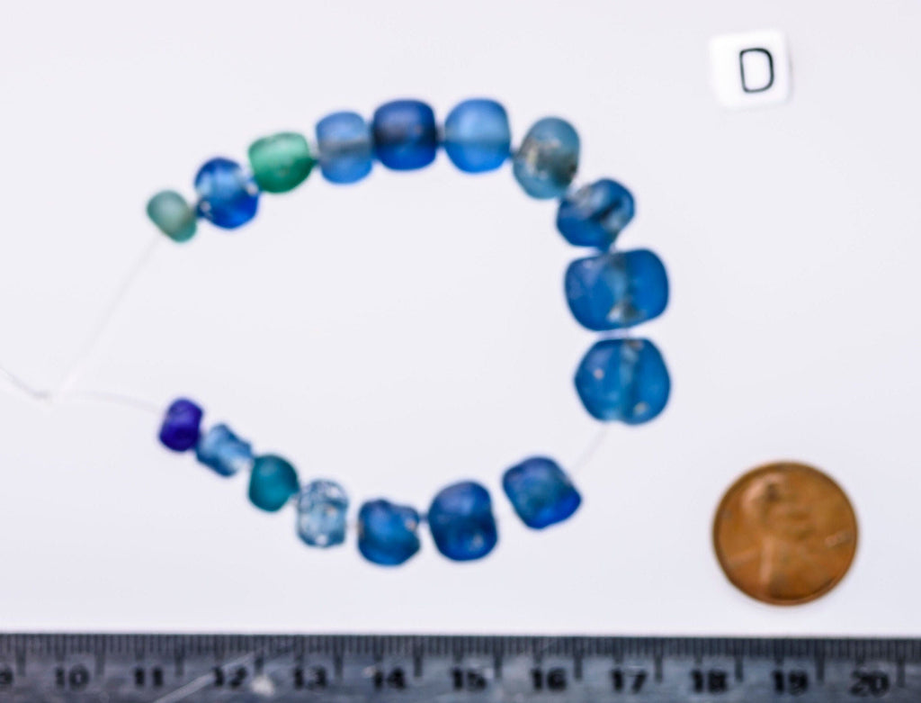 A Short Strand of Small Blue Ancient Islamic Period Beads 0747