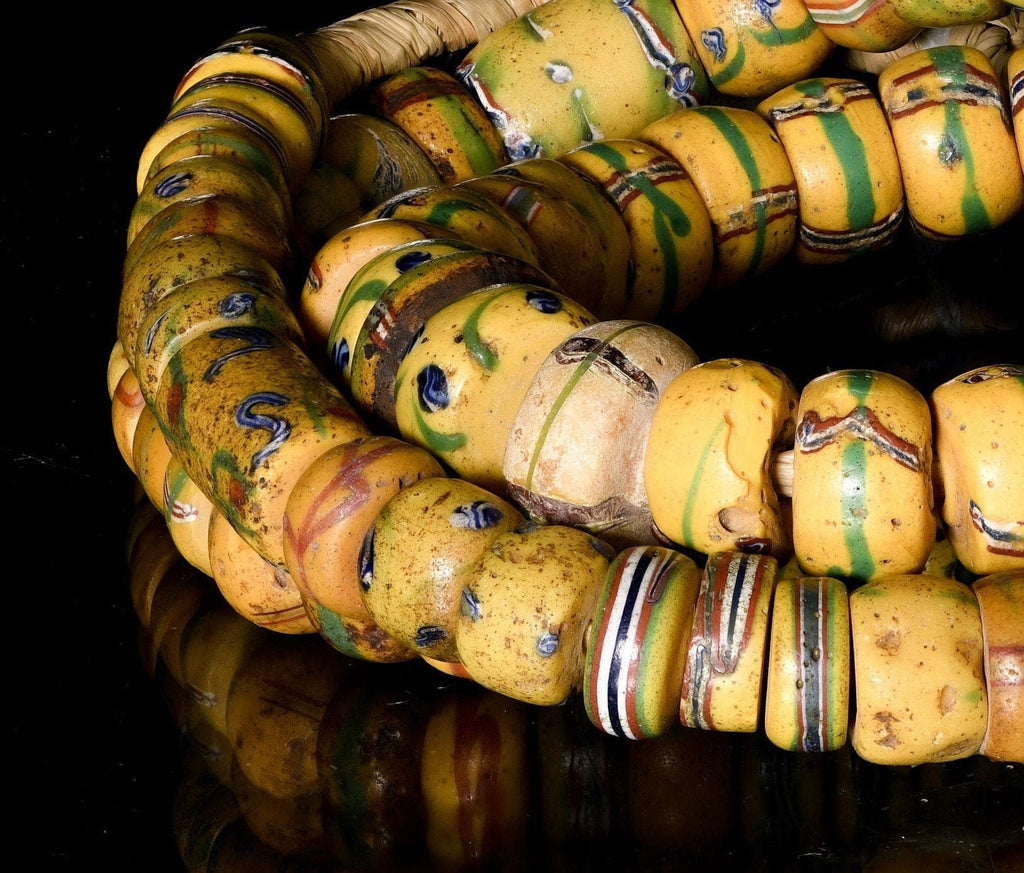 A Strand of Antique Venetian African Trade Beads in Yellow hues  (0262F)
