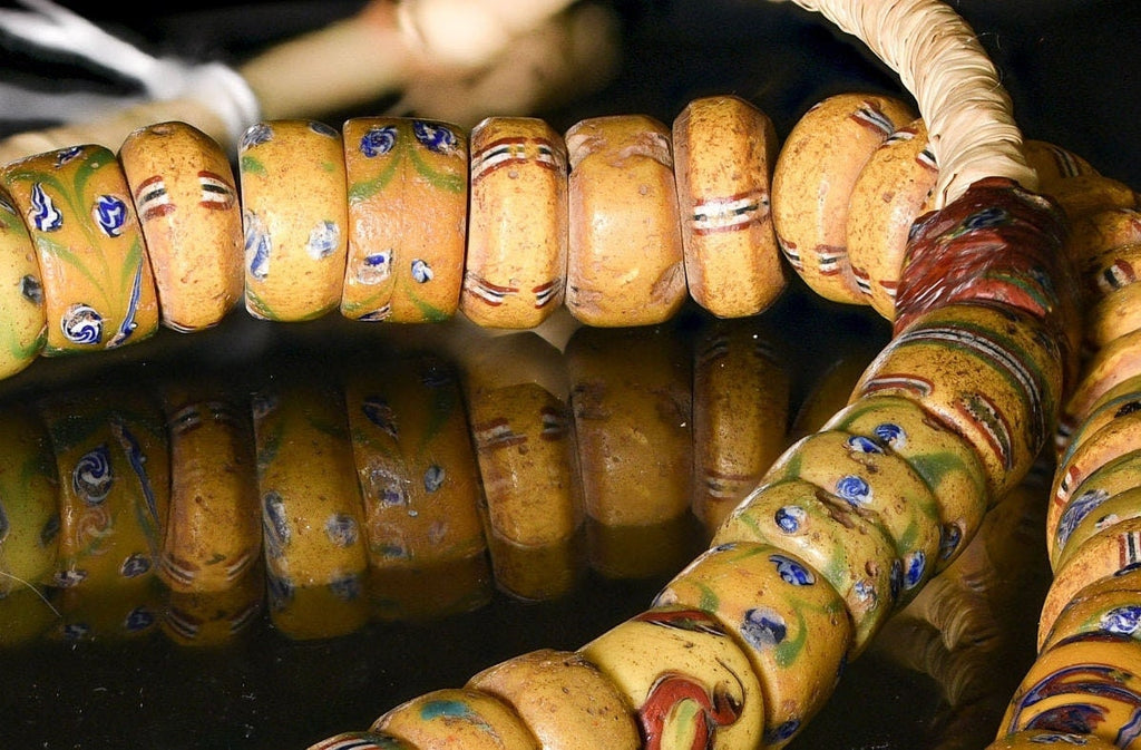 A Strand of Antique Venetian African Trade Beads in Yellow hues  (0262D)