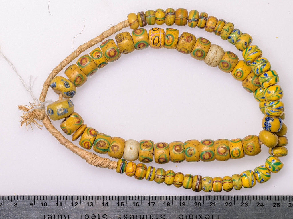 A Strand of Antique Venetian African Trade Beads in Yellow hues  (0262B)