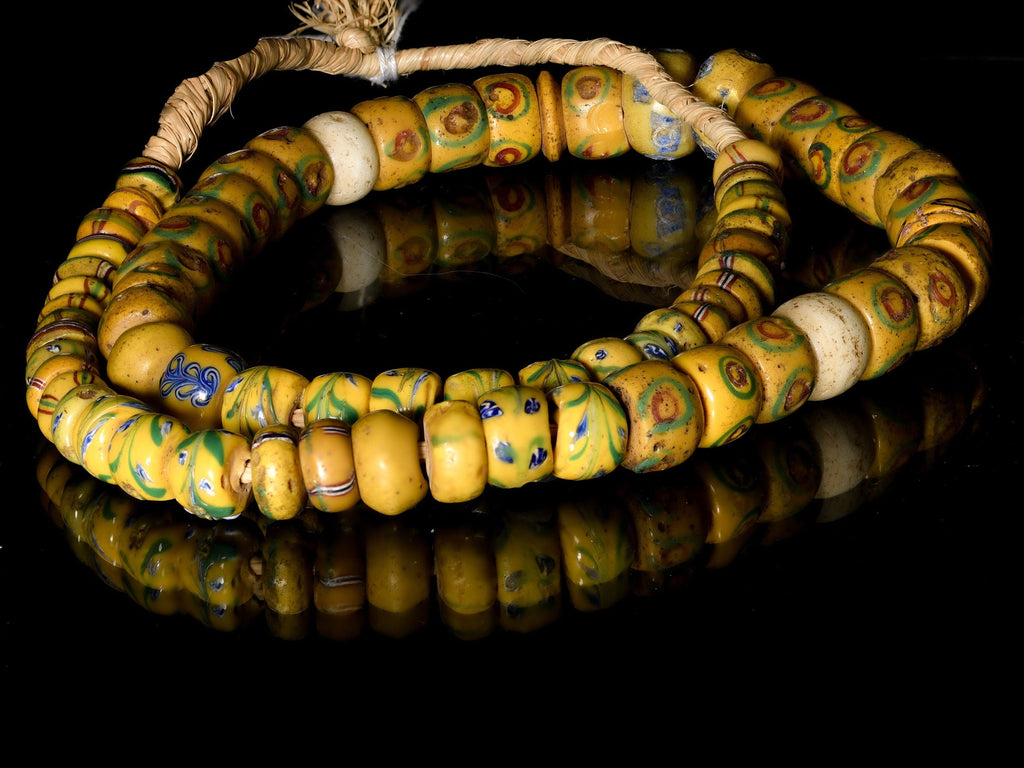 A Strand of Antique Venetian African Trade Beads in Yellow hues  (0262B)