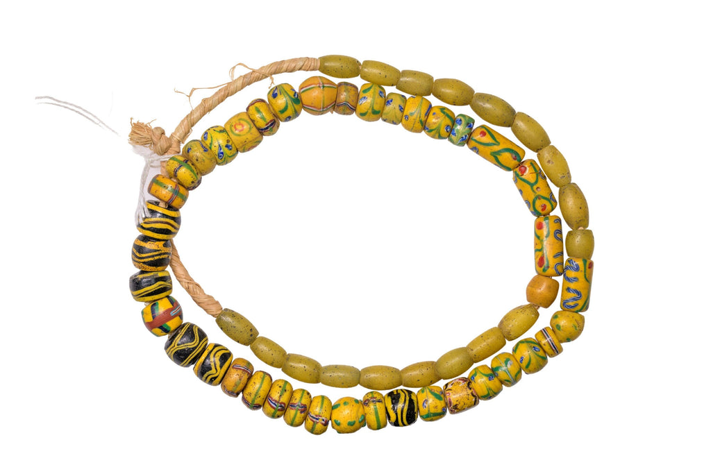 A Strand of Antique Venetian and Bohemian African Trade Beads in Yellow hues  (0262A)