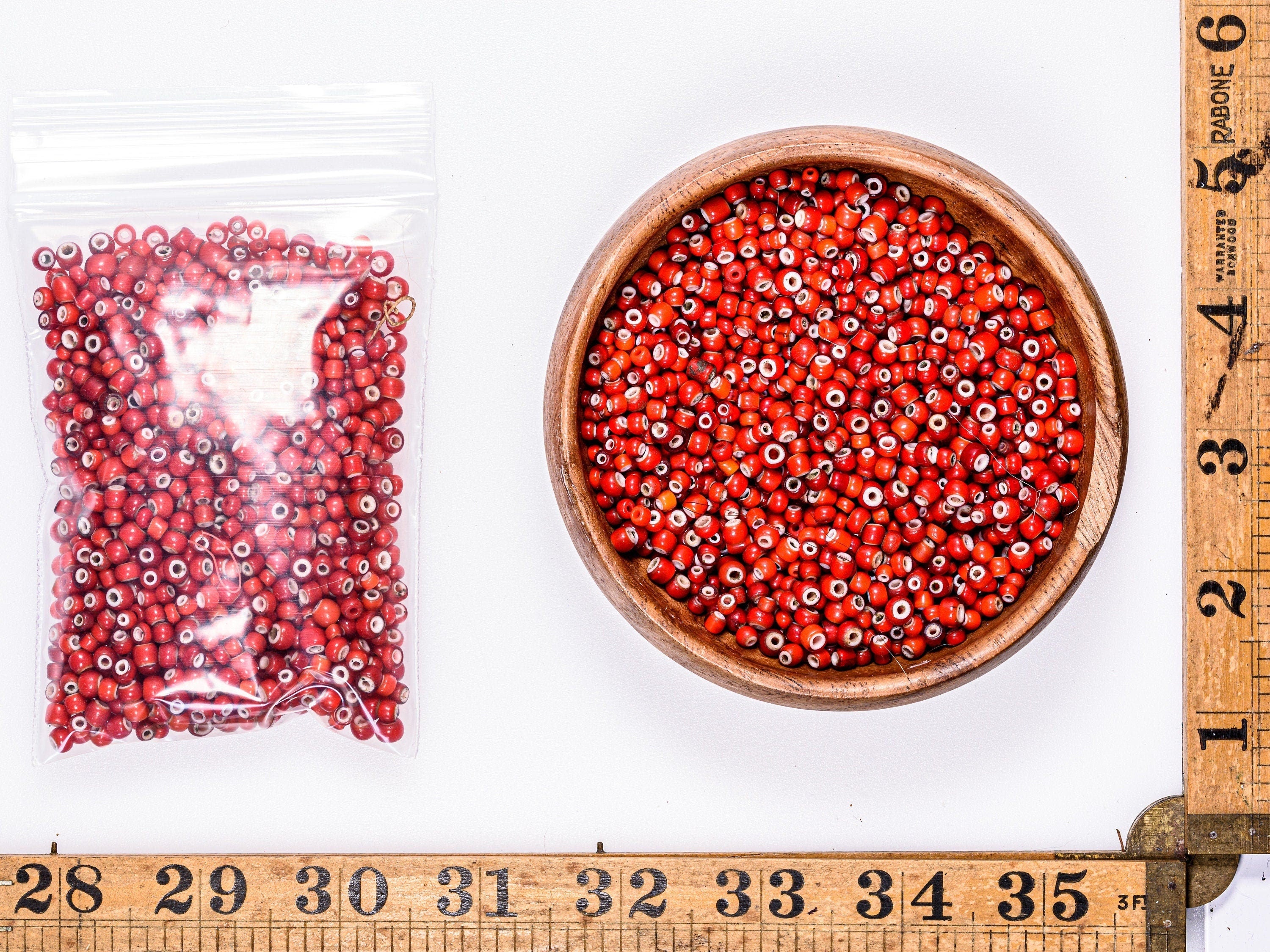 A 100g Bag of Antique Red White Heart African Trade Beads