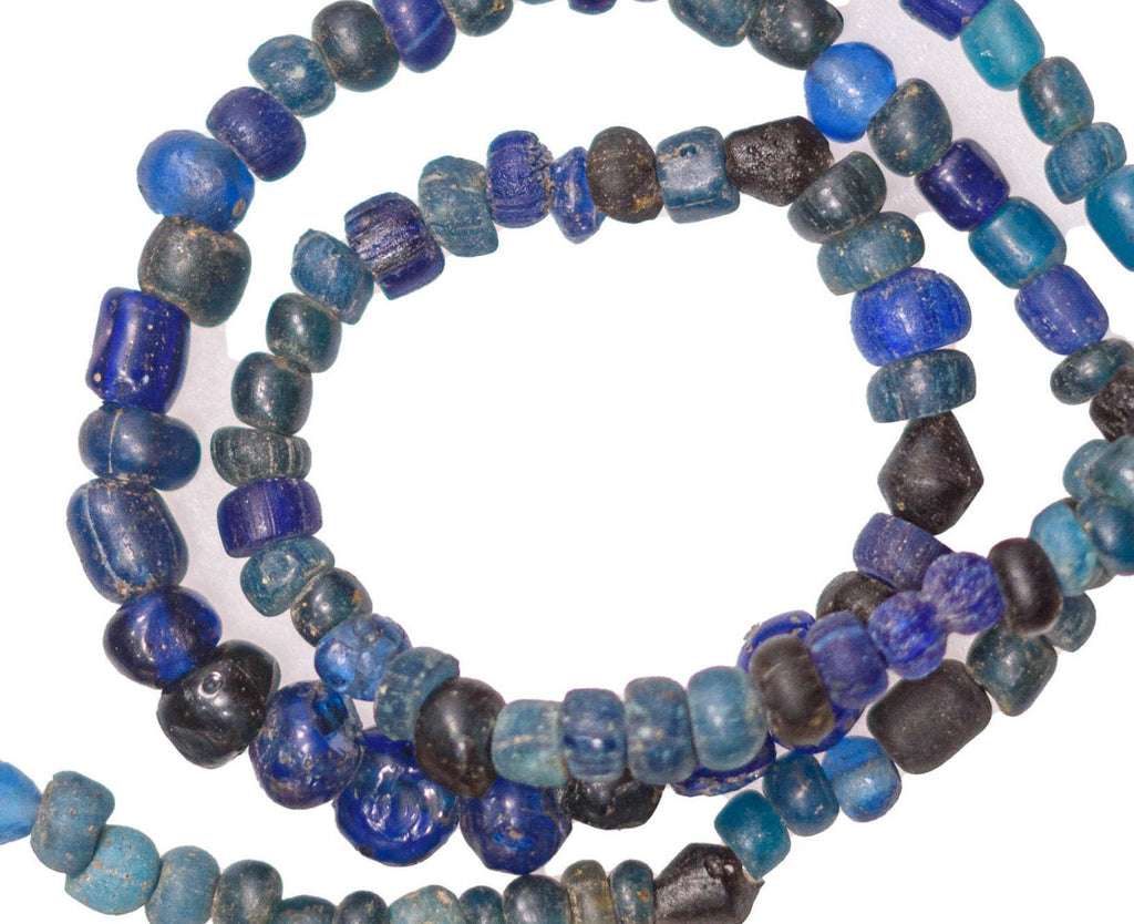 Large Excavated Indo-Pacific Trade Wind Beads in Dark Blue