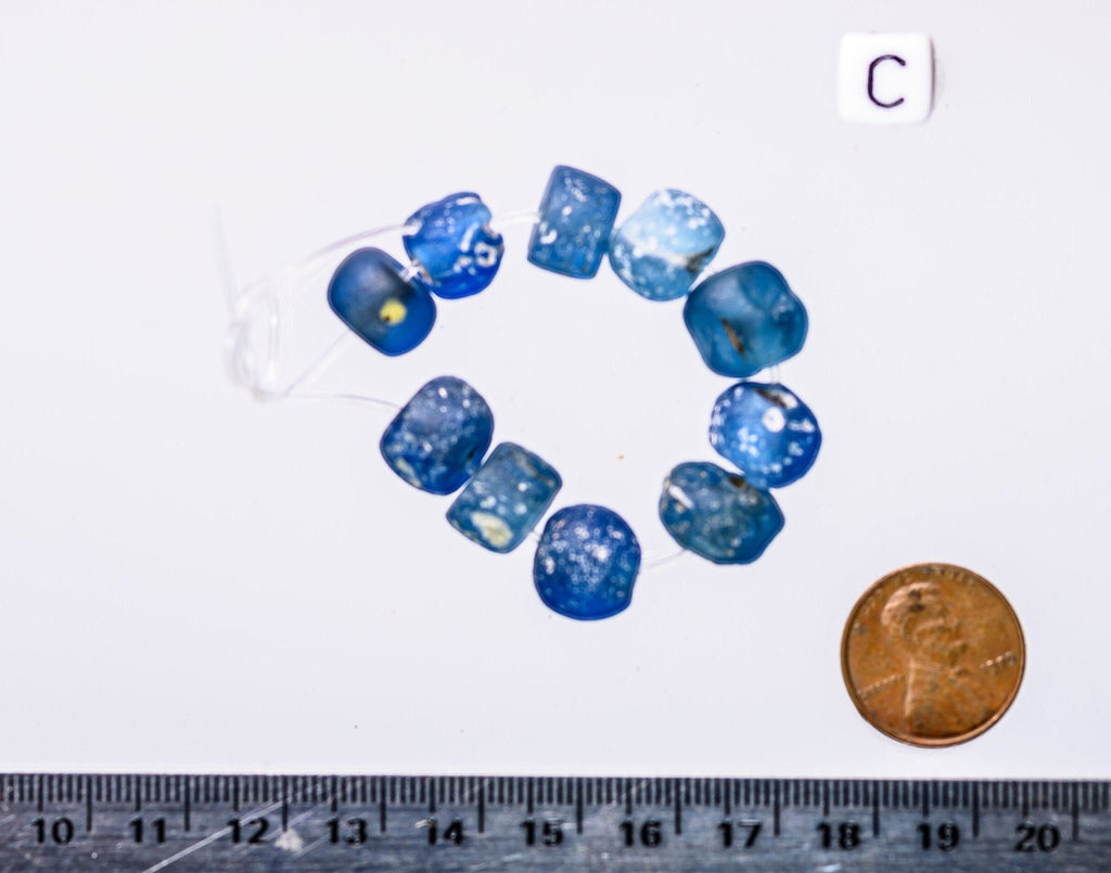 A Short Strand of Small Blue Ancient Islamic Period Beads 0747