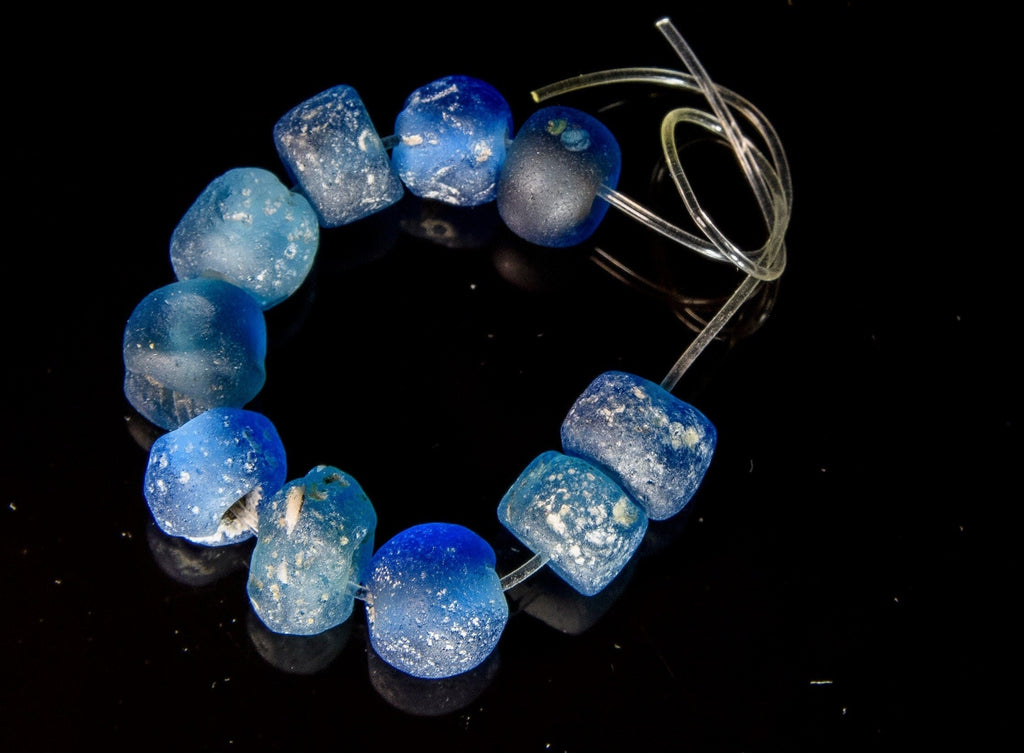 A Short Strand of Small Blue Ancient Islamic Period Beads 0747