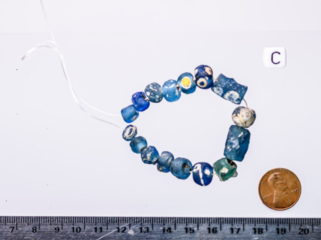 Blue  Ancient Evil Eye Beads:  A Short Strand of 15-17 Ancient Islamic Period Blue Evil Eye Beads 0505