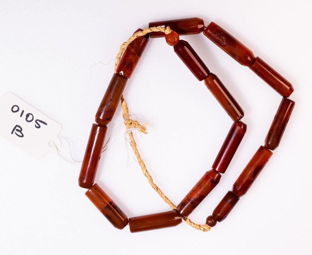 A Strand of Vintage African Trade Carnelian Cylindrical Beads of Unusual Shape