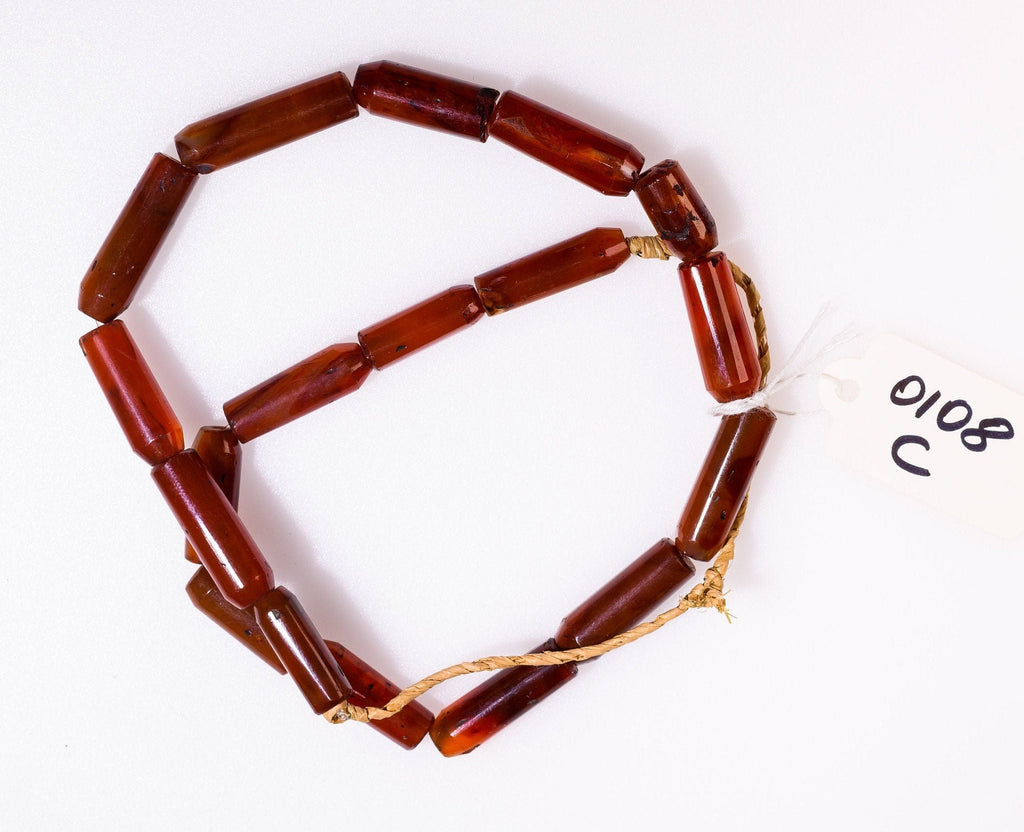 A Strand of Vintage African Trade Carnelian Cylindrical Beads of Unusual Shape